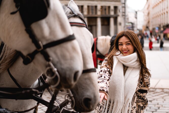1.5 Hour Cinematic Style Portrait Photoshoot and Tour in Vienna - Hofburg Palace with gates, yards, and horse carriage charm
