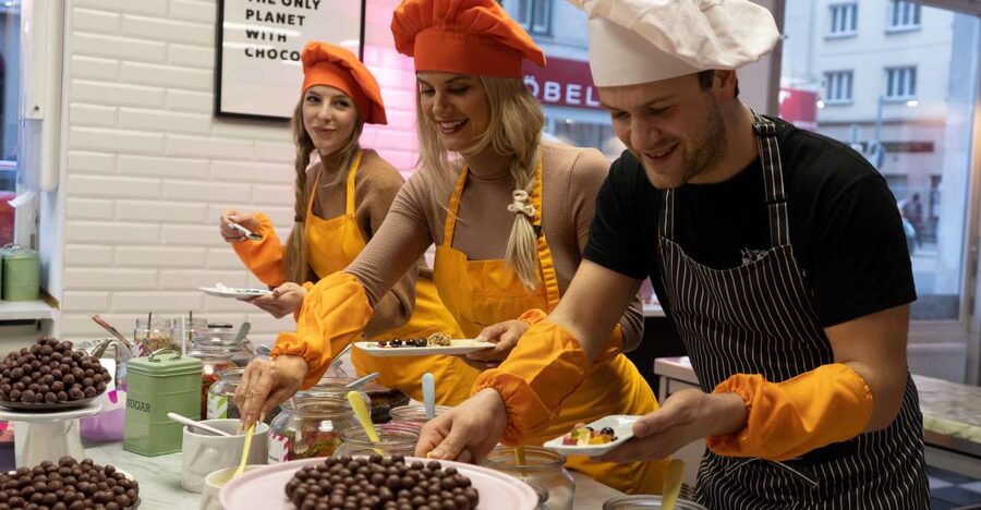 Mozart Kugel Workshop - Choosing milk, white, or dark chocolate coating, plus colorful foil