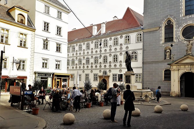 Private Hidden Vienna Walk — Stories Behind Quiet Corners - Schönlaterngasse Stories: The Basilisk Mural and Schnitzel Since 1905