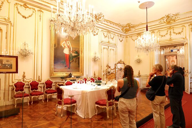Private Vienna Full-Day Tour with Schönbrunn Palace Entry & Lunch - Austrian National Library exterior and Augustinerkirche: Habsburg ceremonies in stone