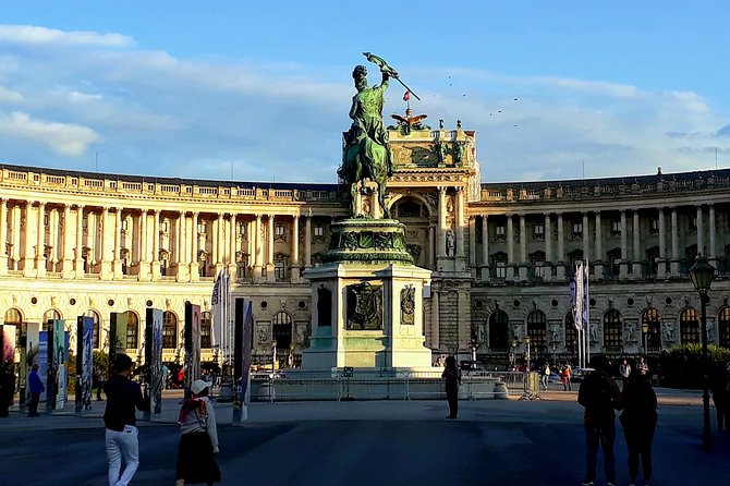 Vienna at First Glance a Private Walking Tour for First Timers - Rathausplatz, Parliament, and Volksgarten: civic Vienna with festivals in the mix