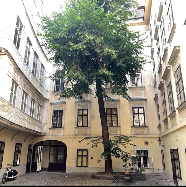 Vienna: Hidden courtyards Guided walking tour - Courtyard atmosphere: plants, architecture, and quiet you can feel
