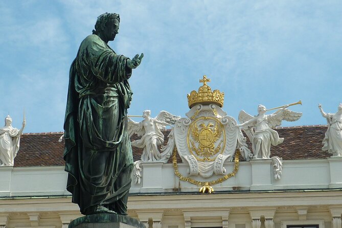 Vienna Secrets Walking Tour to Backyards and Mysterious Locations - Franciscan Church façade time, plus a cat café sighting