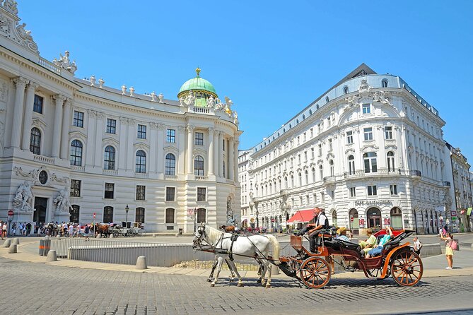 Vienna Walking Tour with Audioguide on Your Smartphone - Stop-by-stop: St. Stephen’s Cathedral, plague column, and the classic church trio