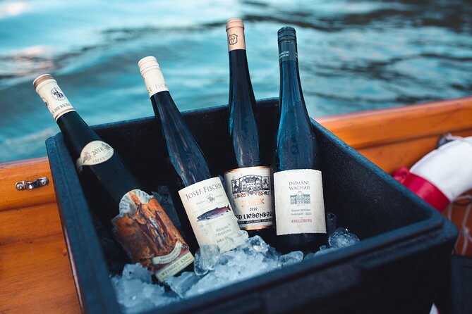 Wine tasting on traditional wooden boats in Wachau Valley - How the captain turns vineyard names into a tasting lesson